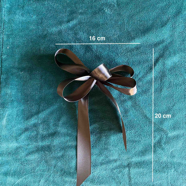 Black Petit satin bow, hand-tied with four loops, shown with dimensions in centimetres